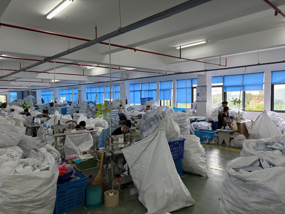 Sewing stations producing disposable hotel slippers and amenity bags